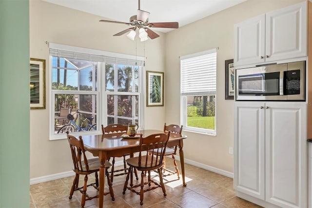 5333 Tide Point Way, Bradenton, FL 34208 - dining room with ceiling fan and light tile patterned floors