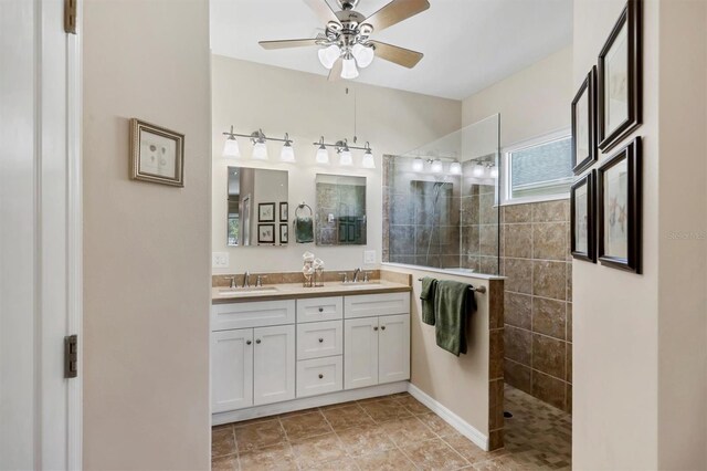 5333 Tide Point Way, Bradenton, FL 34208 - bathroom with double vanity, a walk in shower, and a ceiling fan