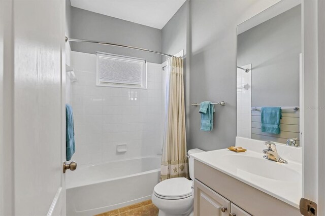 5333 Tide Point Way, Bradenton, FL 34208 - full bathroom featuring vanity, shower / tub combo with curtain, and tile patterned flooring