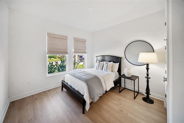 17737 Savory Mist Cir, Bradenton, FL 34211 - bedroom featuring baseboards and light wood-style floors