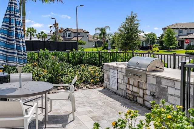 17737 Savory Mist Cir, Bradenton, FL 34211 - view of patio / terrace with area for grilling, a residential view, and outdoor dining area