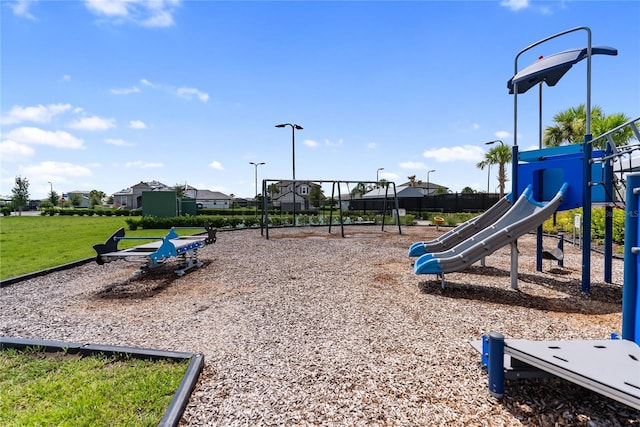 17737 Savory Mist Cir, Bradenton, FL 34211 - community jungle gym with a lawn