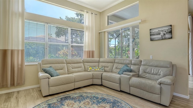 7717 US Open Loop, Lakewood Ranch, FL 34202 - living room featuring ornamental molding and wood finished floors