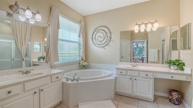 7717 US Open Loop, Lakewood Ranch, FL 34202 - full bath with a bath, tile patterned flooring, two vanities, and a shower stall