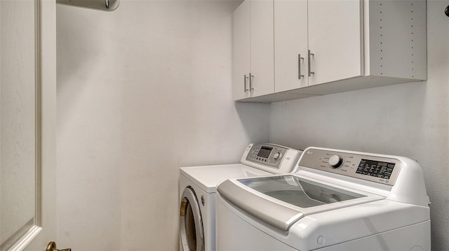 7717 US Open Loop, Lakewood Ranch, FL 34202 - laundry room with cabinet space and separate washer and dryer