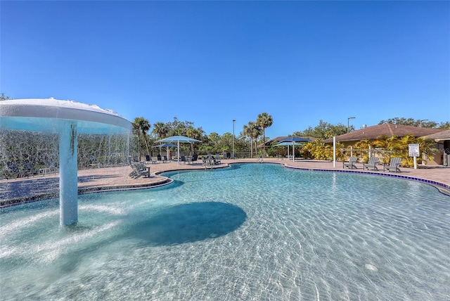 7717 US Open Loop, Lakewood Ranch, FL 34202 - community pool featuring a patio
