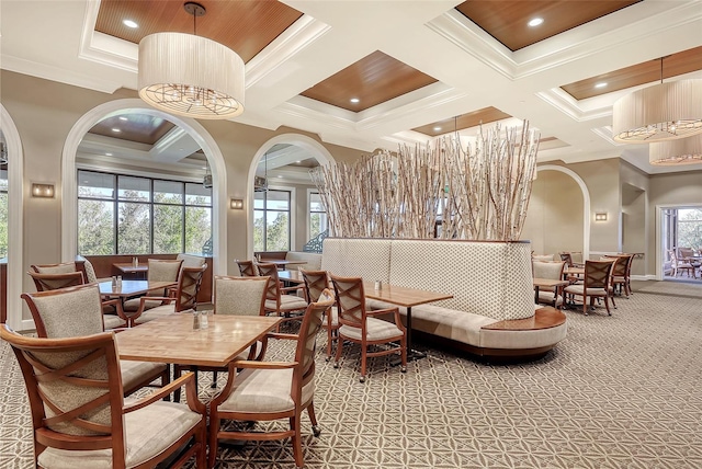 7717 US Open Loop, Lakewood Ranch, FL 34202 - dining area featuring crown molding, coffered ceiling, plenty of natural light, arched walkways, and beamed ceiling