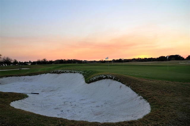 7717 US Open Loop, Lakewood Ranch, FL 34202 - view of property's community featuring view of golf course, a water view, and a putting area