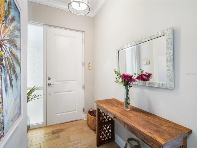 7840 34th Ave W Unit 303, Bradenton, FL 34209 - entryway featuring crown molding and wood finished floors