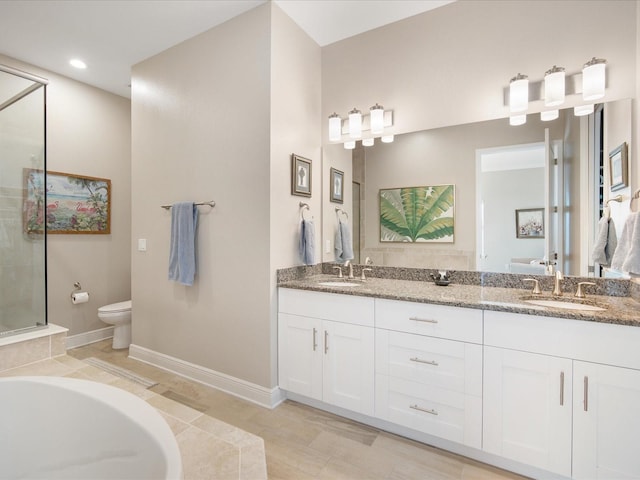 7840 34th Ave W Unit 303, Bradenton, FL 34209 - bathroom with double vanity, a bathtub, tiled shower, and recessed lighting