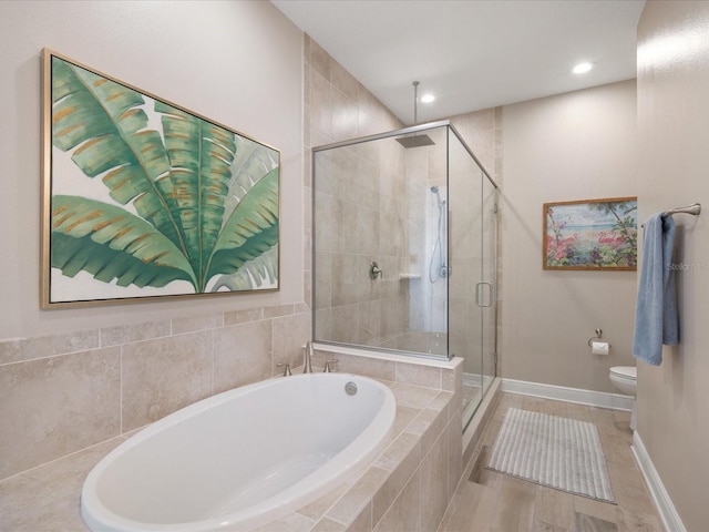 7840 34th Ave W Unit 303, Bradenton, FL 34209 - full bath featuring a garden tub, a stall shower, and recessed lighting