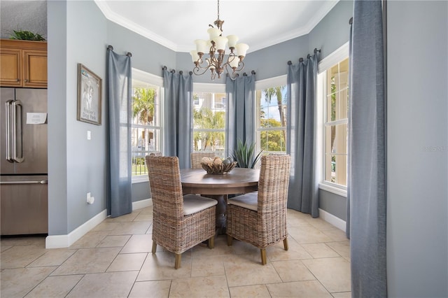 7840 34th Ave W Unit 303, Bradenton, FL 34209 - dining room with a chandelier, plenty of natural light, ornamental molding, and light tile patterned floors