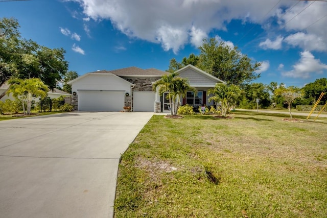 640 Encarnacion St, Punta Gorda, FL 33983 - view of front of property with stone siding, a garage, concrete driveway, and a front lawn
