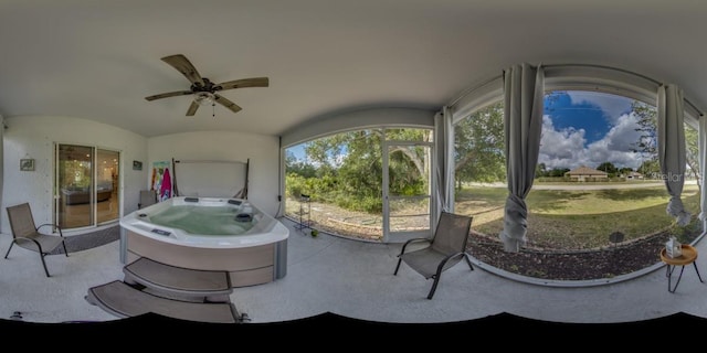 640 Encarnacion St, Punta Gorda, FL 33983 - view of patio / terrace featuring a ceiling fan and a hot tub