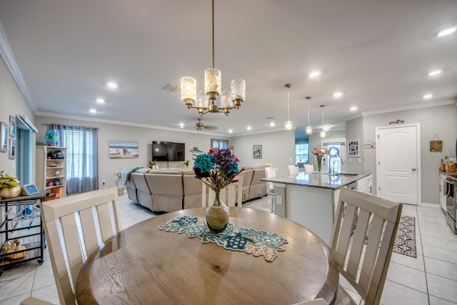 640 Encarnacion St, Punta Gorda, FL 33983 - dining room featuring a chandelier, ornamental molding, light tile patterned floors, recessed lighting, and healthy amount of natural light