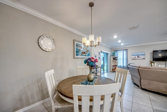 640 Encarnacion St, Punta Gorda, FL 33983 - dining room with light tile patterned floors, crown molding, and a chandelier