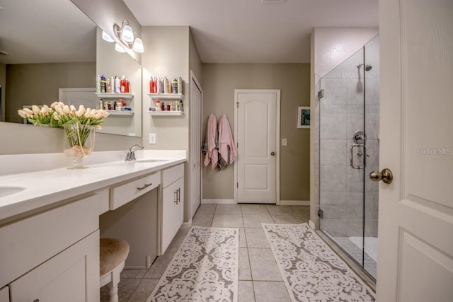 640 Encarnacion St, Punta Gorda, FL 33983 - bathroom featuring double vanity, tile patterned floors, and a shower stall