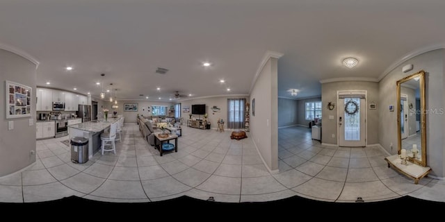 640 Encarnacion St, Punta Gorda, FL 33983 - living area featuring ornamental molding, light tile patterned floors, and recessed lighting