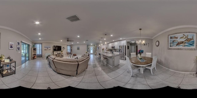 640 Encarnacion St, Punta Gorda, FL 33983 - living room featuring light tile patterned floors, recessed lighting, a chandelier, and ornamental molding