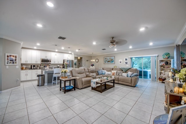 640 Encarnacion St, Punta Gorda, FL 33983 - living area featuring light tile patterned flooring, ceiling fan, crown molding, and recessed lighting