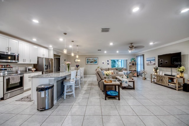 640 Encarnacion St, Punta Gorda, FL 33983 - living room featuring crown molding, recessed lighting, ceiling fan, and light tile patterned flooring