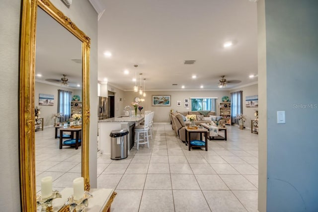 640 Encarnacion St, Punta Gorda, FL 33983 - living area with a ceiling fan, crown molding, light tile patterned floors, and recessed lighting