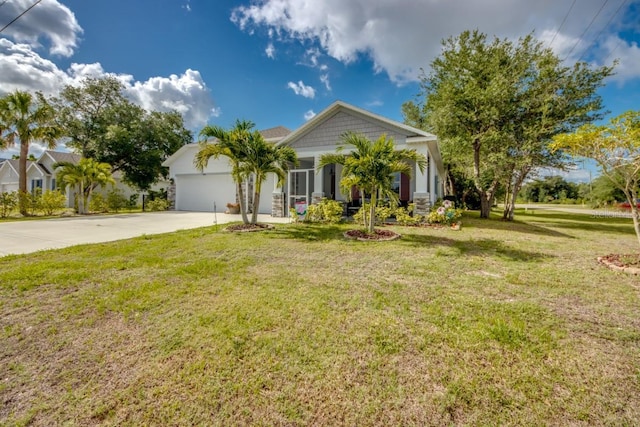 640 Encarnacion St, Punta Gorda, FL 33983 - view of front of home featuring concrete driveway, a garage, and a front yard