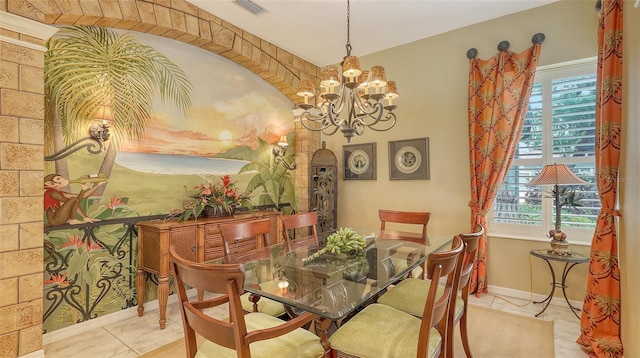 7012 Treymore Ct, Sarasota, FL 34243 - dining room featuring a chandelier and healthy amount of natural light