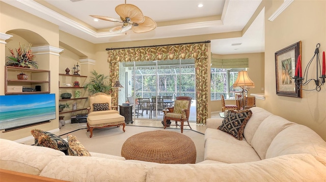 7012 Treymore Ct, Sarasota, FL 34243 - living area featuring a ceiling fan, a tray ceiling, plenty of natural light, crown molding, and recessed lighting