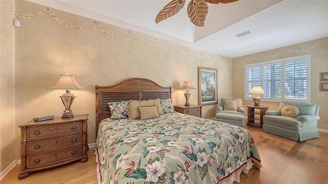 7012 Treymore Ct, Sarasota, FL 34243 - bedroom featuring wood finished floors and ceiling fan