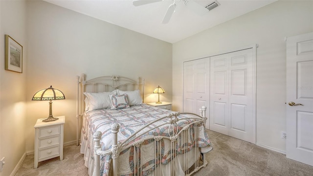 7012 Treymore Ct, Sarasota, FL 34243 - carpeted bedroom with a closet and a ceiling fan