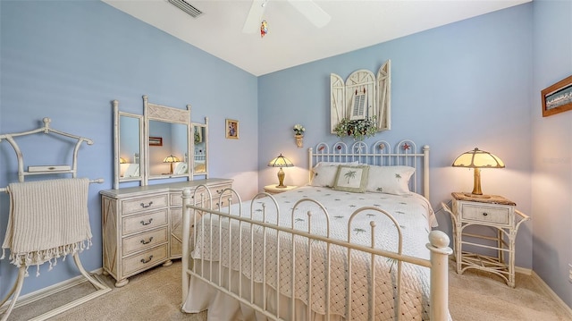 7012 Treymore Ct, Sarasota, FL 34243 - bedroom with light carpet and a ceiling fan
