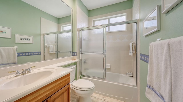 7012 Treymore Ct, Sarasota, FL 34243 - full bathroom with vanity, shower / bath combination with glass door, and tile patterned flooring