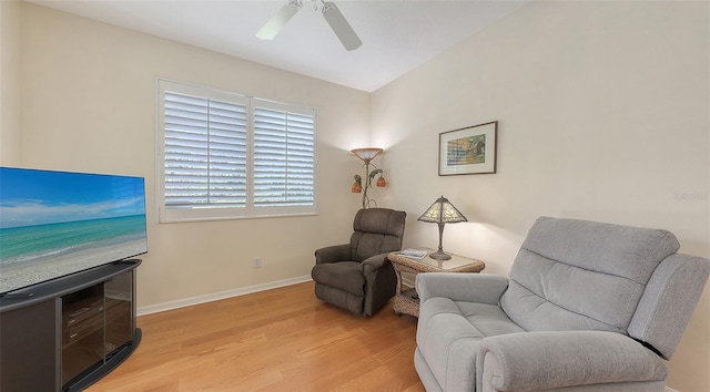 7012 Treymore Ct, Sarasota, FL 34243 - living area featuring light wood-style flooring and a ceiling fan