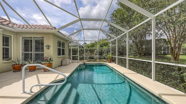 7012 Treymore Ct, Sarasota, FL 34243 - swimming pool featuring a patio area and a lanai
