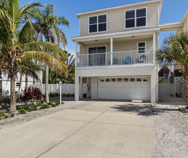 123 52nd St Unit B, Bradenton Beach, FL 34217 - coastal inspired home featuring driveway and an attached garage