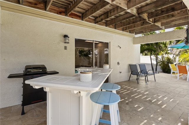 123 52nd St Unit B, Bradenton Beach, FL 34217 - view of patio with outdoor dining area and a grill