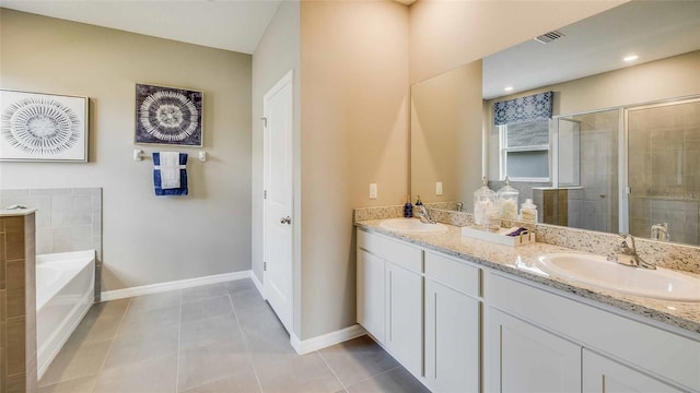 12048 Kingsley Trl, Parrish, FL 34219 - bathroom featuring double vanity, a shower stall, a bath, and tile patterned flooring