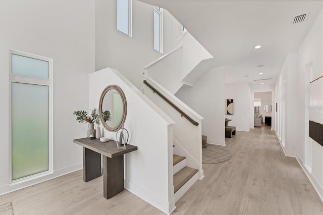 6028 Red Mangrove Ln, Bradenton, FL 34210 - stairs with wood finished floors, recessed lighting, and plenty of natural light