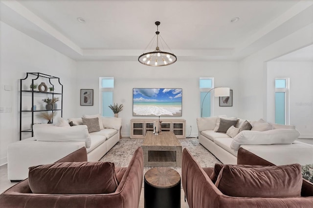 6028 Red Mangrove Ln, Bradenton, FL 34210 - living area with a chandelier and a raised ceiling