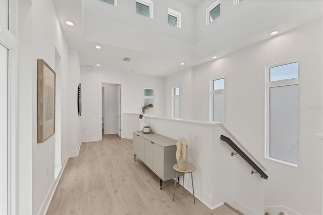 6028 Red Mangrove Ln, Bradenton, FL 34210 - hall with light wood-style floors and recessed lighting