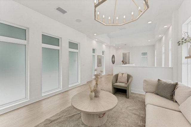 6028 Red Mangrove Ln, Bradenton, FL 34210 - living room featuring recessed lighting and wood finished floors