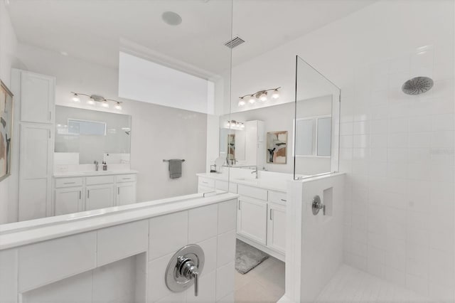 6028 Red Mangrove Ln, Bradenton, FL 34210 - full bathroom with walk in shower and two vanities