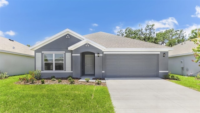 12071 Mountain Island Trl, Parrish, FL 34219 - ranch-style house featuring a garage, concrete driveway, a front lawn, and stucco siding