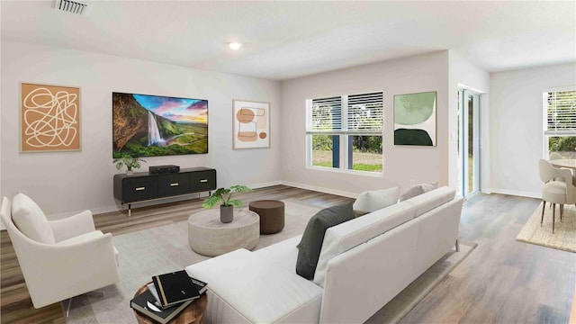 12071 Mountain Island Trl, Parrish, FL 34219 - living room featuring wood finished floors