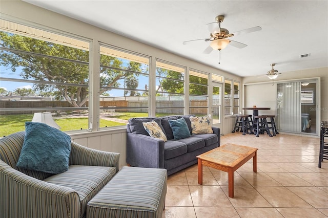 409 Archibald Ave, Sarasota, FL 34243 - sunroom featuring an outdoor living space and a ceiling fan