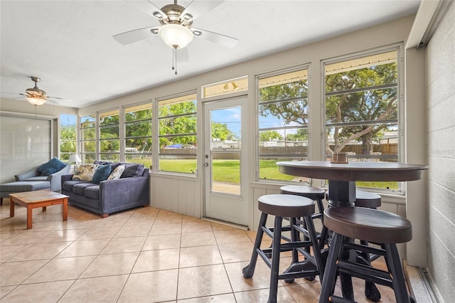 409 Archibald Ave, Sarasota, FL 34243 - sunroom featuring a ceiling fan and healthy amount of natural light