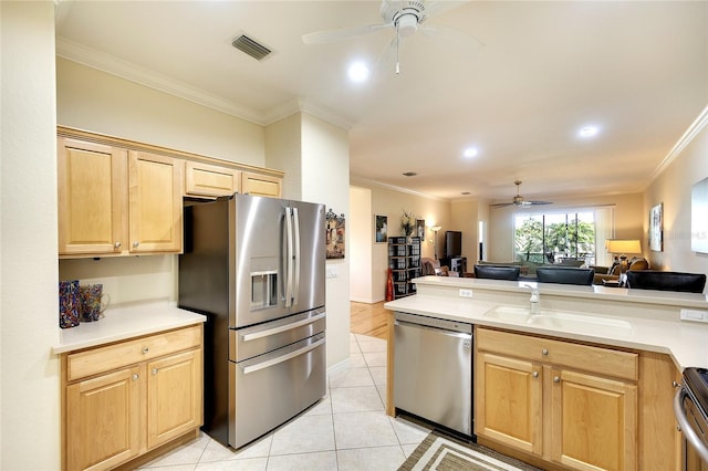 362 Fairway Isles Ln, Bradenton, FL 34212 - kitchen with stainless steel appliances, a ceiling fan, open floor plan, ornamental molding, and light brown cabinetry