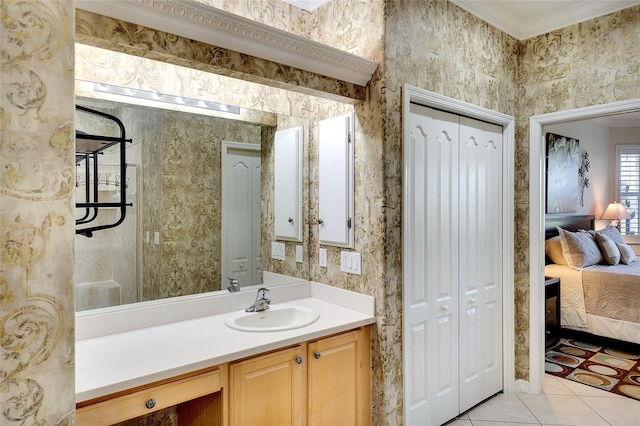 362 Fairway Isles Ln, Bradenton, FL 34212 - bathroom with vanity, tile patterned floors, ensuite bathroom, a closet, and crown molding