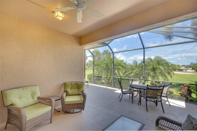 362 Fairway Isles Ln, Bradenton, FL 34212 - sunroom with ceiling fan and outdoor dining area